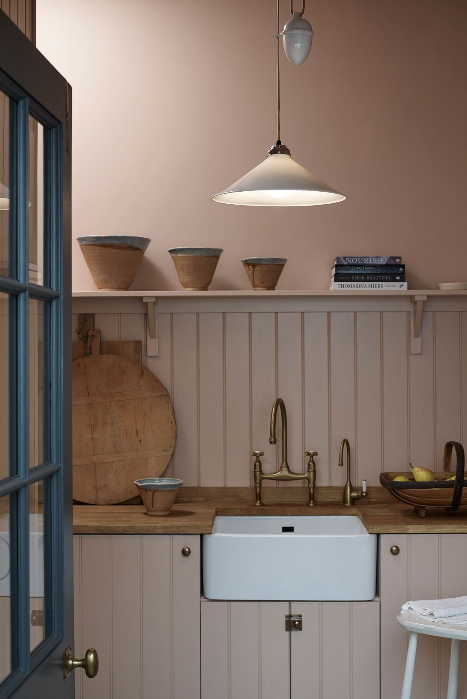 OBTC Lifestyle Image: Modern interior featuring Cobb Rise & Fall Large Pendant, Natural White & Satin Brass