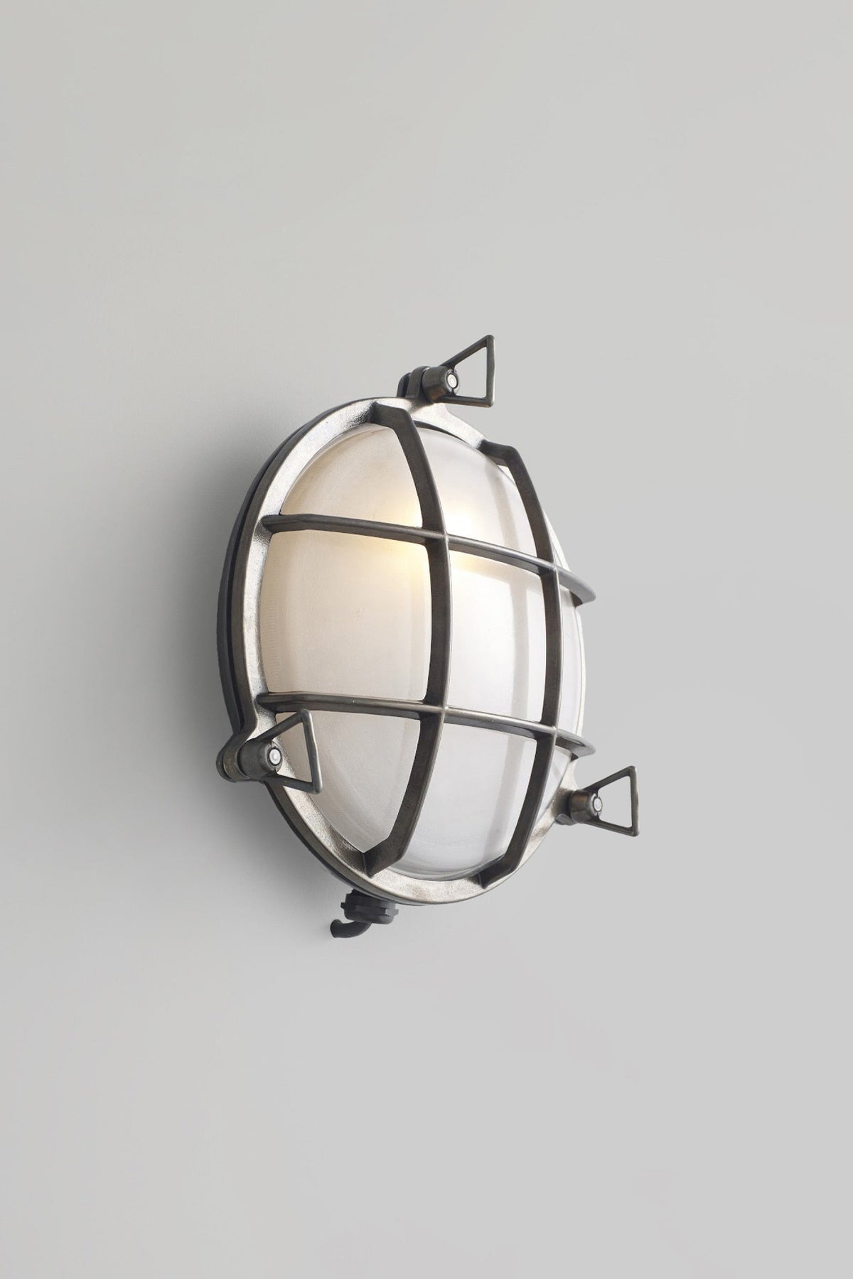 OBTC Product Image, Light On: 7027 Brass Bulkhead, Weathered Brass, Frosted Glass, Davey Lighting Range