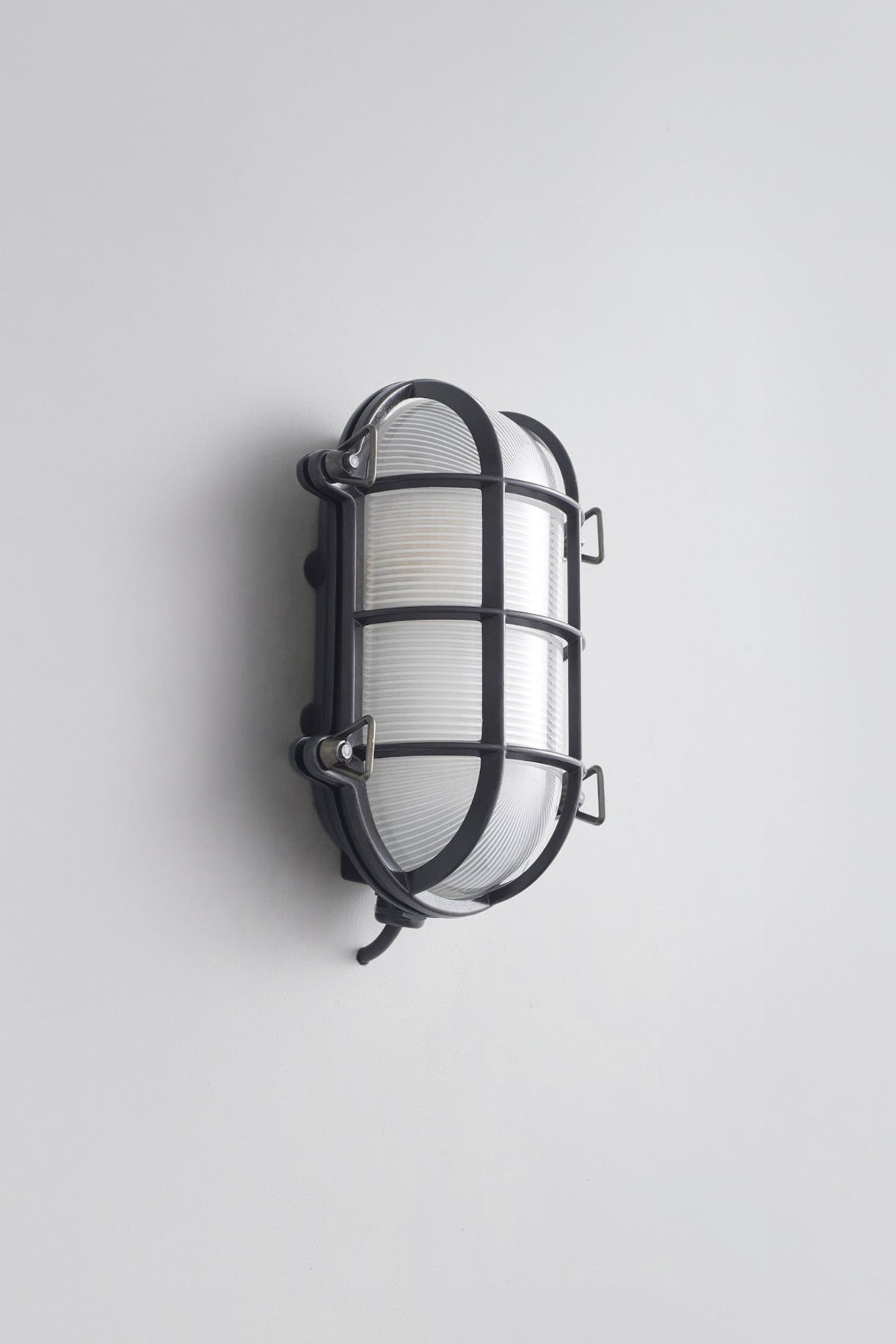 OBTC Product Image, Light Off: Oval Brass Bulkhead 7035, Weathered Brass, Frosted Prismatic Glass, Davey Lighting Range