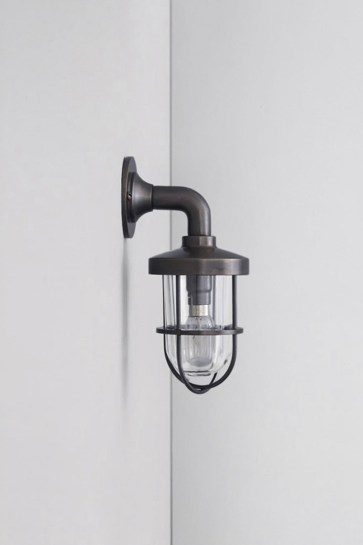 OBTC Product Image, Light Off: Miniature Weatherproof Ship's Well Glass Light 7207, Weathered Brass, Clear Glass, Davey Lighting Range