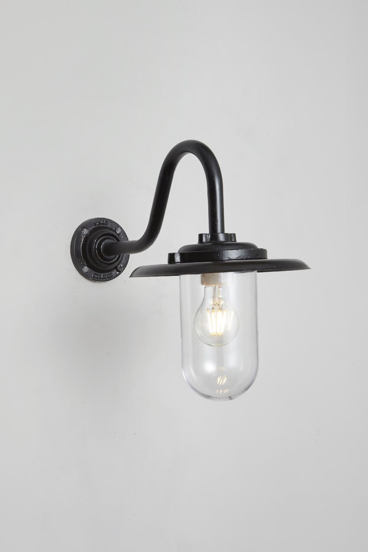 OBTC Product Image, Light On: Exterior Bracket Light, 100W, Swan Neck 7677, Black, Clear Glass, Davey Lighting Range